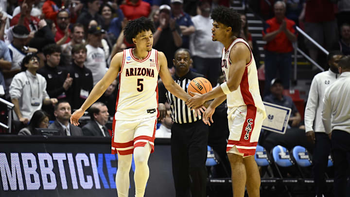 Mar 22, 2026; San Diego, CA, USA; Arizona Wildcats guard Brayden Burries (5) and forward Koa Peat (10) react in the second half against the Utah State Aggies during a second round game of the men's 2026 NCAA Tournament at Viejas Arena. Mandatory Credit: Denis Poroy-Imagn Images Mar 22, 2026; San Diego, CA, USA; Arizona Wildcats guard Brayden Burries (5) and forward Koa Peat (10) react in the second half against the Utah State Aggies during a second round game of the men's 2026 NCAA Tournament at Viejas Arena. Mandatory Credit: Denis Poroy-Imagn Images