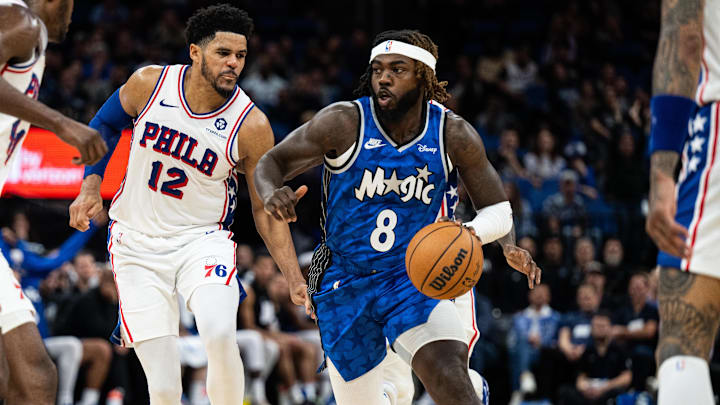 Jan 19, 2024; Orlando, Florida, USA; Orlando Magic guard Kevon Harris (8) dribbles the ball against Philadelphia 76ers forward Tobias Harris (12) in the fourth quarter at KIA Center. Mandatory Credit: Jeremy Reper-Imagn Images Jan 19, 2024; Orlando, Florida, USA; Orlando Magic guard Kevon Harris (8) dribbles the ball against Philadelphia 76ers forward Tobias Harris (12) in the fourth quarter at KIA Center. Mandatory Credit: Jeremy Reper-Imagn Images