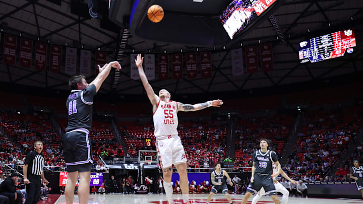 Feb 17, 2025; Salt Lake City, Utah, USA; Kansas State Wildcats guard Brendan Hausen (11) shoots over Utah Utes guard Gabe Madsen (55) during the first half at Jon M. Huntsman Center. Mandatory Credit: Rob Gray-Imagn Images Feb 17, 2025; Salt Lake City, Utah, USA; Kansas State Wildcats guard Brendan Hausen (11) shoots over Utah Utes guard Gabe Madsen (55) during the first half at Jon M. Huntsman Center. Mandatory Credit: Rob Gray-Imagn Images