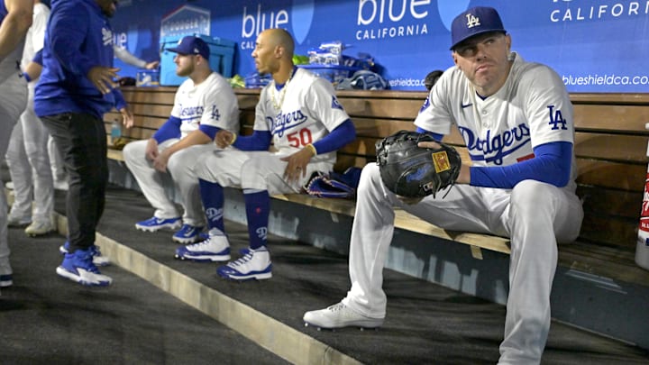 Sep 26, 2024; Los Angeles, California, USA;  Los Angeles Dodgers first baseman Freddie Freeman (5) sits in the dugout prior to the start of the game against the San Diego Padres at Dodger Stadium. Mandatory Credit: Jayne Kamin-Oncea-Imagn Images