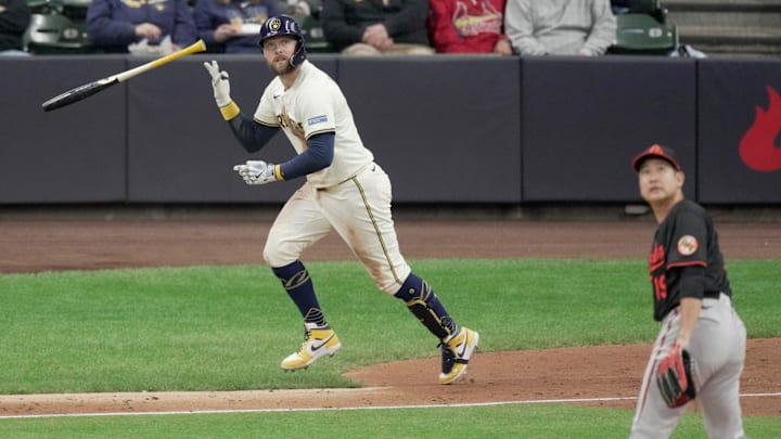 Milwaukee Brewers first baseman Rhys Hoskins (12) hits a solo home run off of Baltimore Orioles pitcher Tomoyuki Sugano (19) during the sixth inning of their game Wednesday, May 21, 2025 at American Family Field in Milwaukee, Wisconsin.