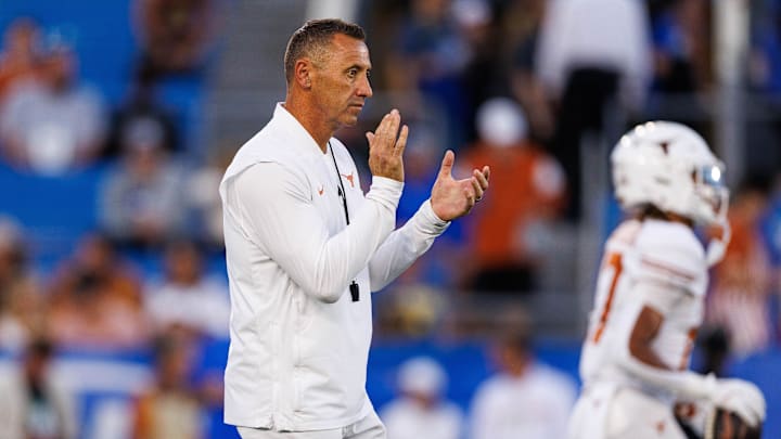 Oct 18, 2025; Lexington, Kentucky, USA; Texas Longhorns head coach Steve Sarkisian claps during warmups before the game against the Kentucky Wildcats at Kroger Field. Mandatory Credit: Jordan Prather-Imagn Images