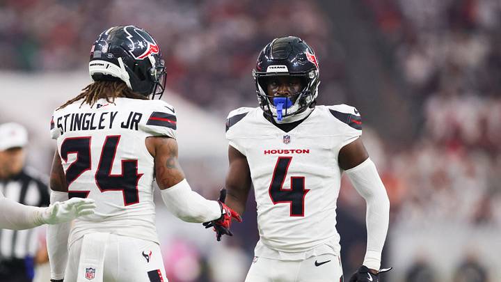 Houston Texans cornerback Kamari Lassiter (4) celebrates with Houston Texans cornerback Derek Stingley Jr. (24)