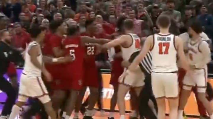The Wolfpack and Cavaliers benches cleared at John Paul Jones Arena. 