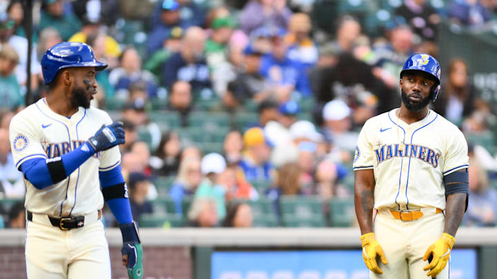 Seattle Mariners right fielder Victor Robles (10) and left fielder Randy Arozarena (56) interact after Robles scored a run against the Oakland Athletics during the fifth inning at T-Mobile Park in 2024. Seattle Mariners right fielder Victor Robles (10) and left fielder Randy Arozarena (56) interact after Robles scored a run against the Oakland Athletics during the fifth inning at T-Mobile Park in 2024.