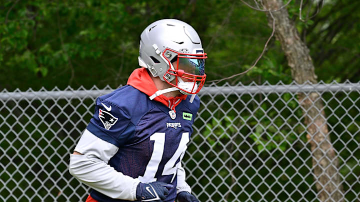 Jun 9, 2025; Foxborough, MA, USA; New England Patriots linebacker Robert Spillane (14) walks to the practice fields at Gillette Stadium. Mandatory Credit: Eric Canha-Imagn Images