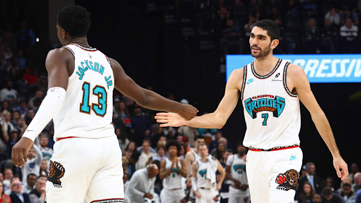 Feb 8, 2025; Memphis, Tennessee, USA; Memphis Grizzlies forward Santi Aldama (7) reacts with forward Jaren Jackson Jr. (13) during the fourth quarter against the Oklahoma City Thunder at FedExForum. Mandatory Credit: Petre Thomas-Imagn Images