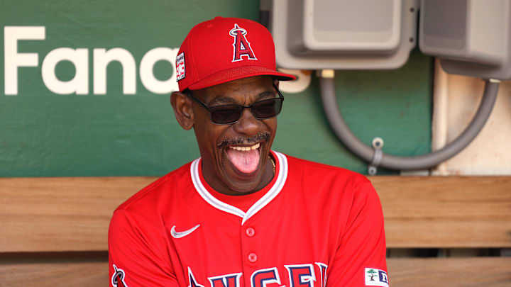 Jul 21, 2024; Oakland, California, USA; Los Angeles Angels manager Ron Washington (37) laughs in the dugout before the game against the Oakland Athletics at Oakland-Alameda County Coliseum. Mandatory Credit: Darren Yamashita-Imagn Images