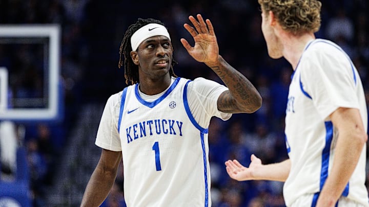 Feb 4, 2026; Lexington, Kentucky, USA; Kentucky Wildcats guard Denzel Aberdeen (1) celebrates with guard Collin Chandler (5) during the second half against the Oklahoma Sooners at Rupp Arena at Central Bank Center. Mandatory Credit: Jordan Prather-Imagn Images Feb 4, 2026; Lexington, Kentucky, USA; Kentucky Wildcats guard Denzel Aberdeen (1) celebrates with guard Collin Chandler (5) during the second half against the Oklahoma Sooners at Rupp Arena at Central Bank Center. Mandatory Credit: Jordan Prather-Imagn Images
