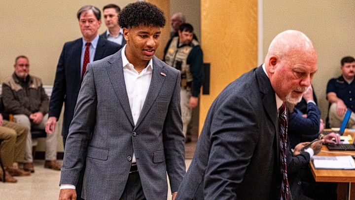 Ole Miss quarterback Trinidad Chambliss enters the courtroom during his lawsuit against the NCAA at Calhoun County Courthouse in Pittsboro, Miss., on Thursday, Feb. 12, 2026. Chambliss is looking for a temporary injunction and a permanent injunction against the NCAA for one more year of eligibility.