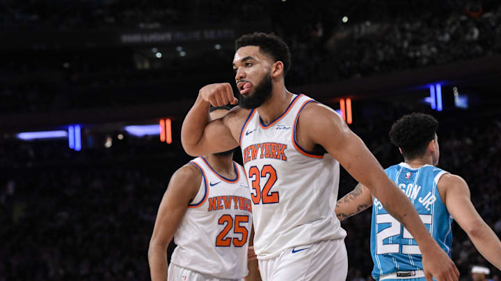 Dec 5, 2024; New York, New York, USA; New York Knicks center Karl-Anthony Towns (32) reacts during the second  half against the Charlotte Hornets at Madison Square Garden. Mandatory Credit: John Jones-Imagn Images