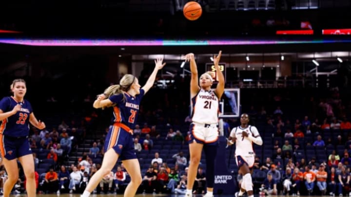 Kymora Johnson shoots for three.