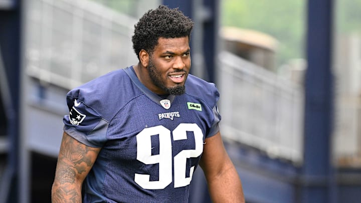 Jun 9, 2025; Foxborough, MA, USA; New England Patriots defensive tackle Joshua Farmer (92) walks to the practice fields at Gillette Stadium. Mandatory Credit: Eric Canha-Imagn Images Jun 9, 2025; Foxborough, MA, USA; New England Patriots defensive tackle Joshua Farmer (92) walks to the practice fields at Gillette Stadium. Mandatory Credit: Eric Canha-Imagn Images
