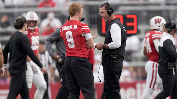 Wisconsin head coach Luke Fickell talks with injured quarterback Billy Edwards Jr. (9) during the fourth quarter of the game Saturday, September 6, 2025 at Camp Randall Stadium in Madison, Wisconsin. Wisconsin beat Middle Tennessee 42-10.
