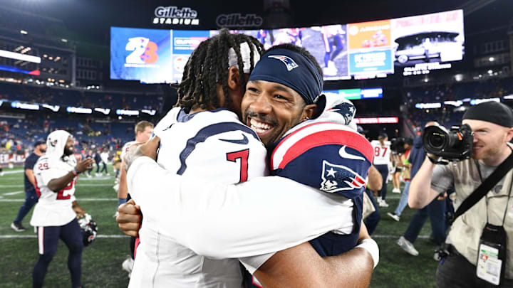 Aug 10, 2023; Foxborough, Massachusetts, USA; Houston Texans quarterback C.J. Stroud (7) hugs New England Patriots cornerback Jack Jones (13) after a game at Gillette Stadium. Mandatory Credit: Brian Fluharty-Imagn Images