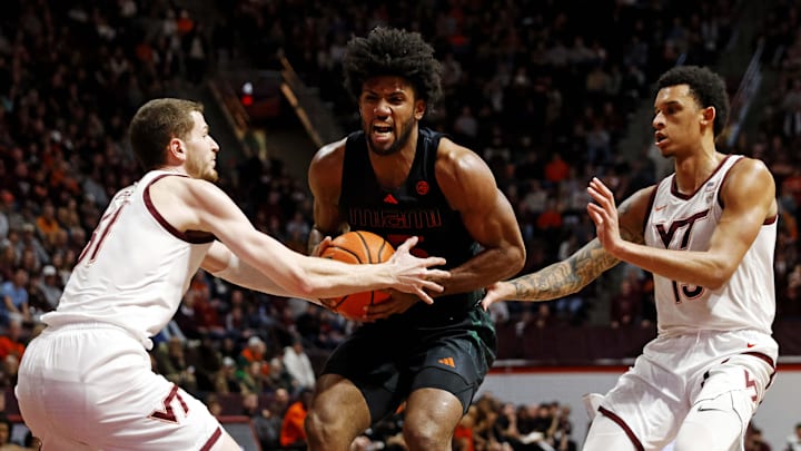 Jan 13, 2024; Blacksburg, Virginia, USA; Miami Hurricanes forward Norchad Omier (15) drives to the