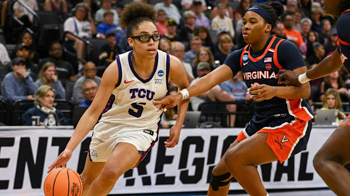 Mar 28, 2026; Sacramento, CA, USA; Texas Christian University Horned Frogs guard Olivia Miles (5) drives against Virginia Cavaliers guard Gabby White (3) during the third quarter in the Sweet Sixteen game of the Sacramento Regional 4 of the women's 2026 NCAA Tournament at Golden 1 Center. Mandatory Credit: Ed Szczepanski-Imagn Images
