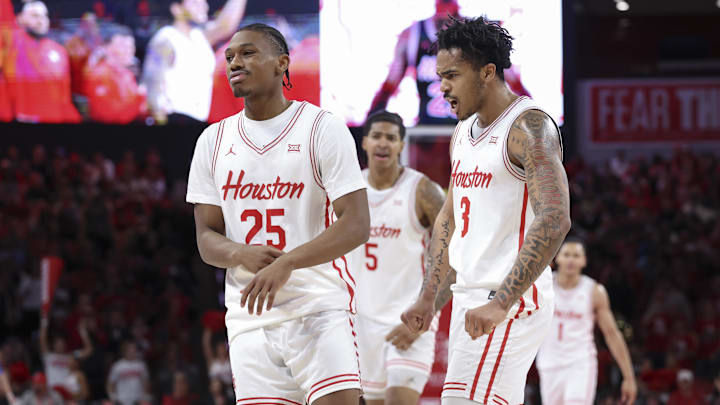 Dec 29, 2025; Houston, Texas, USA; Houston Cougars guard Mercy Miller (25) reacts with guard Ramon Walker Jr. (3) after scoring a basket during the second half against the Middle Tennessee Blue Raiders at Fertitta Center. Mandatory Credit: Troy Taormina-Imagn Images Dec 29, 2025; Houston, Texas, USA; Houston Cougars guard Mercy Miller (25) reacts with guard Ramon Walker Jr. (3) after scoring a basket during the second half against the Middle Tennessee Blue Raiders at Fertitta Center. Mandatory Credit: Troy Taormina-Imagn Images