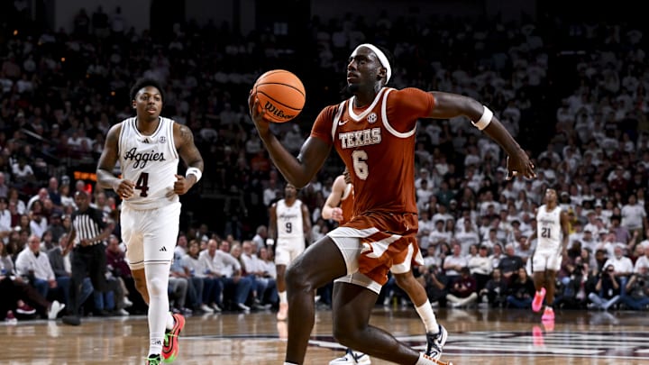 Jan 4, 2025; College Station, Texas, USA; Texas Longhorns forward Arthur Kaluma (6) drives to the basket during the second half against the Texas A&M Aggies at Reed Arena. The Aggies defeated the Longhorns 80-60. Mandatory Credit: Maria Lysaker-Imagn Images Jan 4, 2025; College Station, Texas, USA; Texas Longhorns forward Arthur Kaluma (6) drives to the basket during the second half against the Texas A&M Aggies at Reed Arena. The Aggies defeated the Longhorns 80-60. Mandatory Credit: Maria Lysaker-Imagn Images