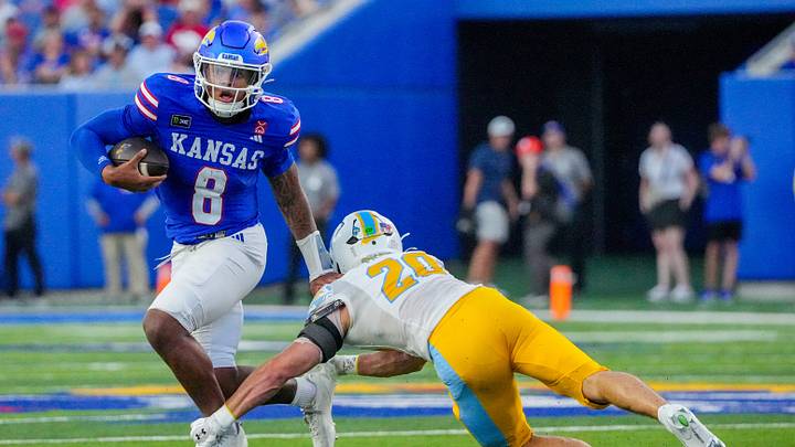 Kansas Jayhawks quarterback Isaiah Marshall (8) 