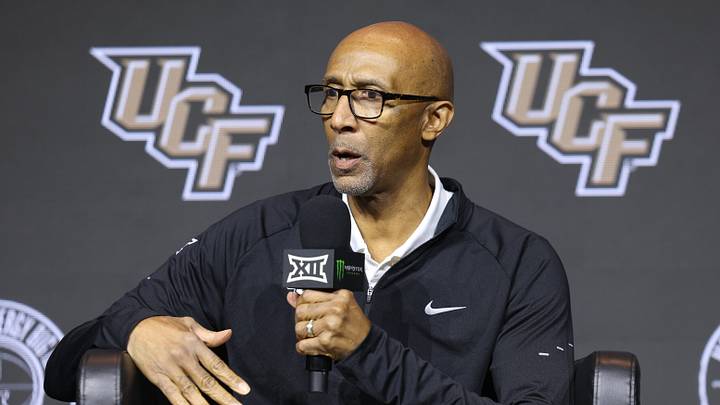 Oct 21, 2026; Kansas City, MO, USA;  UCF coach Johnny Dawkins is interviewed during the big 12 Media Days at T-Mobile Center.  Mandatory Credit: William Purnell-Imagn Images