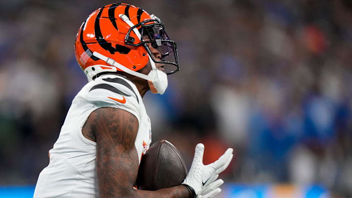 Cincinnati Bengals wide receiver Tee Higgins (5) catches a deep pass for a touchdown in the third quarter of the NFL Week 11 game between the Los Angeles Chargers and the Cincinnati Bengals at SoFi Stadium in Inglewood, Calif., on Sunday, Nov. 17, 2024. The Chargers won 34-27. Cincinnati Bengals wide receiver Tee Higgins (5) catches a deep pass for a touchdown in the third quarter of the NFL Week 11 game between the Los Angeles Chargers and the Cincinnati Bengals at SoFi Stadium in Inglewood, Calif., on Sunday, Nov. 17, 2024. The Chargers won 34-27.