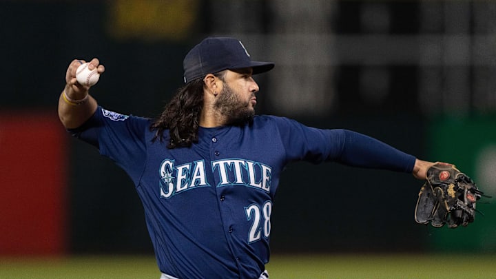 Seattle Mariners third baseman Eugenio Suarez (28) throws the ball during the fourth inning against the Oakland Athletics at Oakland-Alameda County Coliseum in 2023.