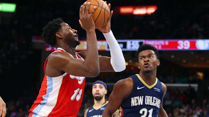 Jan 24, 2025; Memphis, Tennessee, USA; Memphis Grizzlies forward Jaren Jackson Jr. (13) shoots as New Orleans Pelicans center Yves Missi (21) defends during the second quarter at FedExForum. Mandatory Credit: Petre Thomas-Imagn Images