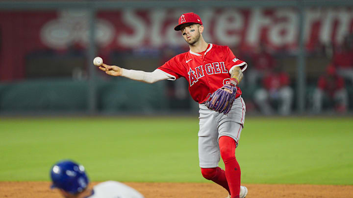 Sep 3, 2025; Kansas City, Missouri, USA; Los Angeles Angels shortstop Zach Neto (9) throws to first base during the fifth inning against the Kansas City Royals at Kauffman Stadium. Mandatory Credit: Jay Biggerstaff-Imagn Images