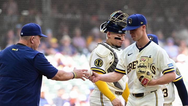 Jun 4, 2026; Milwaukee, Wisconsin, USA; Milwaukee Brewers starting pitcher Coleman Crow (57) hands the ball to manager Pat Murphy during a pitching change in the third inning against the San Francisco Giants at American Family Field. Mandatory Credit: Benny Sieu-Imagn Images Jun 4, 2026; Milwaukee, Wisconsin, USA; Milwaukee Brewers starting pitcher Coleman Crow (57) hands the ball to manager Pat Murphy during a pitching change in the third inning against the San Francisco Giants at American Family Field. Mandatory Credit: Benny Sieu-Imagn Images