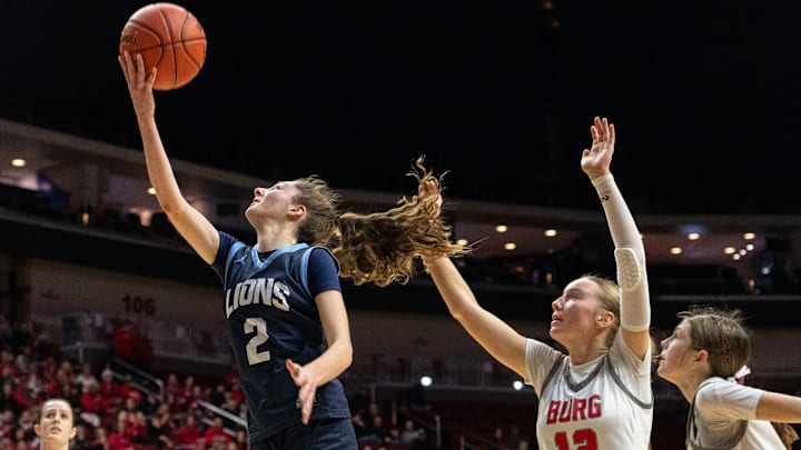 Des Moines Christian's Addy Oetker attempts a layup during the IGHSAU state basketball tournament at Wells Fargo Arena on Tuesday, March 4, 2025, in Des Moines.