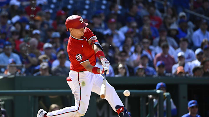 Apr 27, 2025; Washington, District of Columbia, USA; Washington Nationals outfielder Alex Call hits a RBI single against the New York Mets during the seventh inning at Nationals Park. 