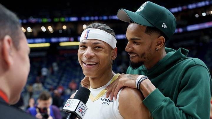 Feb 9, 2026; New Orleans, Louisiana, USA; New Orleans Pelicans guard Dejounte Murray hugs New Orleans Pelicans guard Jeremiah Fears (0) after the game against the Sacramento Kings at Smoothie King Center. Mandatory Credit: Matthew Hinton-Imagn Images