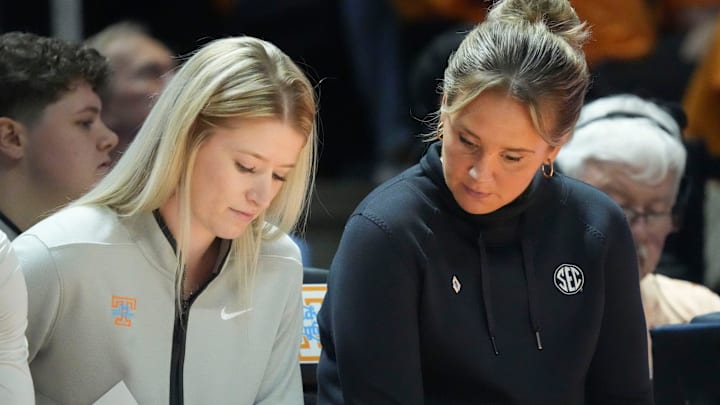 Lady Vols coach Kim Caldwell confers with assistant coach Jenna Burdette during Tennessee's game against Middle Tennessee State on Nov. 12, 2024, in Knoxville, Tenn. Burdette has been Caldwell's assistant at every stop, starting at Glenville State in 2018.