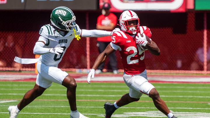 Sep 5, 2026; Lincoln, Nebraska, USA; Nebraska Cornhuskers running back Jamal Rule (25) runs against Ohio Bobcats defensive back Barry Dillon (8) during the third quarter at Memorial Stadium. Mandatory Credit: Dylan Widger-Imagn Images Sep 5, 2026; Lincoln, Nebraska, USA; Nebraska Cornhuskers running back Jamal Rule (25) runs against Ohio Bobcats defensive back Barry Dillon (8) during the third quarter at Memorial Stadium. Mandatory Credit: Dylan Widger-Imagn Images