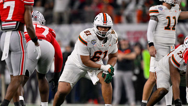 Dec 31, 2025; Arlington, TX, USA; Miami Hurricanes offensive lineman Francis Mauigoa (61) lines up during the 2025 Cotton Bowl and quarterfinal game of the College Football Playoff at AT&T Stadium. Mandatory Credit: Jerome Miron-Imagn Images