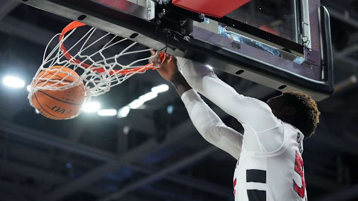 Cincinnati Bearcats forward Aziz Bandaogo (55) dunks in the first half of a college basketball game against the San Francisco Dons in the National Invitational Tournament, Wednesday, March 20, 2024, at Fifth Third Arena in Cincinnati.