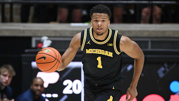 Feb 17, 2026; West Lafayette, Indiana, USA; Michigan Wolverines guard Trey McKenney (1) drives the ball down court during the first half against the Purdue Boilermakers at Mackey Arena. Mandatory Credit: Marc Lebryk-Imagn Images