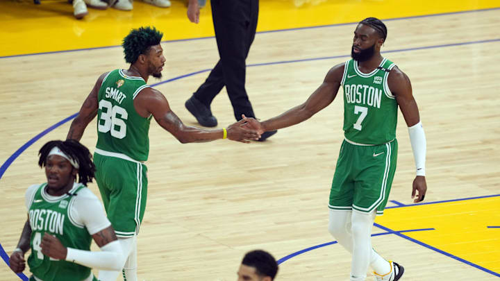 Jun 5, 2022; San Francisco, California, USA; Boston Celtics guard Jaylen Brown (7) ad guard Marcus Smart (36) react in the first quarter during game two of the 2022 NBA Finals at Chase Center. Mandatory Credit: Darren Yamashita-Imagn Images