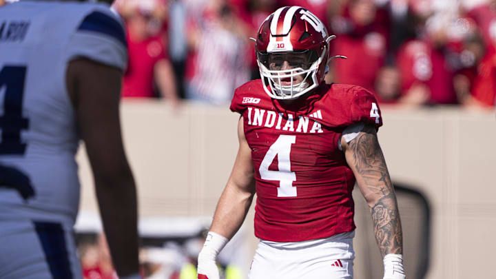 Oct 26, 2024; Bloomington, Indiana, USA; Indiana Hoosiers linebacker Aiden Fisher (4) gets ready for the snap during the second quarter of a game against the Washington Huskies at Memorial Stadium. Mandatory Credit: Jacob Musselman-Imagn Images