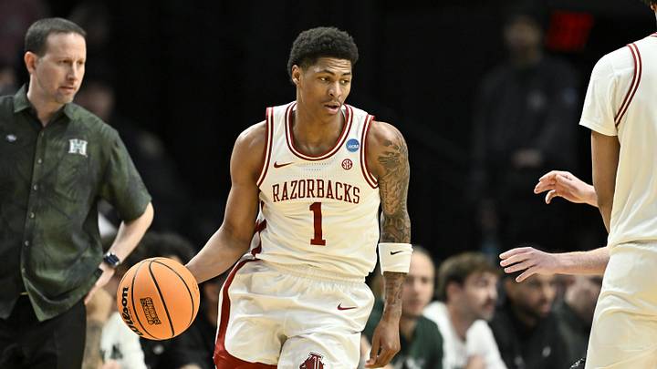 Mar 19, 2026; Portland, OR, USA; Arkansas Razorbacks guard Meleek Thomas (1) dribbles in the first half against the Hawaii Rainbow Warriors during a first round game of the men's 2026 NCAA Tournament at Moda Center. Mandatory Credit: Craig Strobeck-Imagn Images