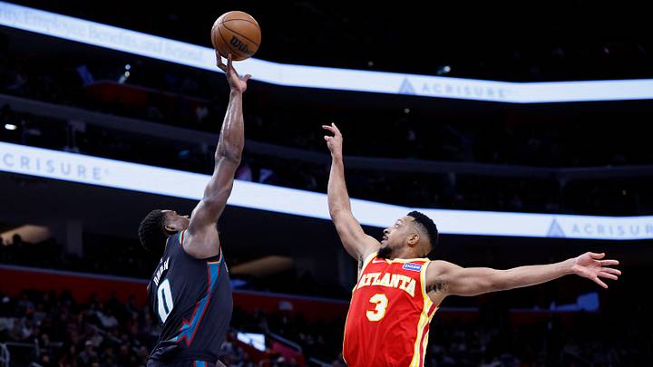 Mar 25, 2026; Detroit, Michigan, USA; Detroit Pistons center Jalen Duren (0) blocks a shot by Atlanta Hawks guard CJ McCollum (3) in the second half at Little Caesars Arena. Mandatory Credit: Rick Osentoski-Imagn Images Mar 25, 2026; Detroit, Michigan, USA; Detroit Pistons center Jalen Duren (0) blocks a shot by Atlanta Hawks guard CJ McCollum (3) in the second half at Little Caesars Arena. Mandatory Credit: Rick Osentoski-Imagn Images