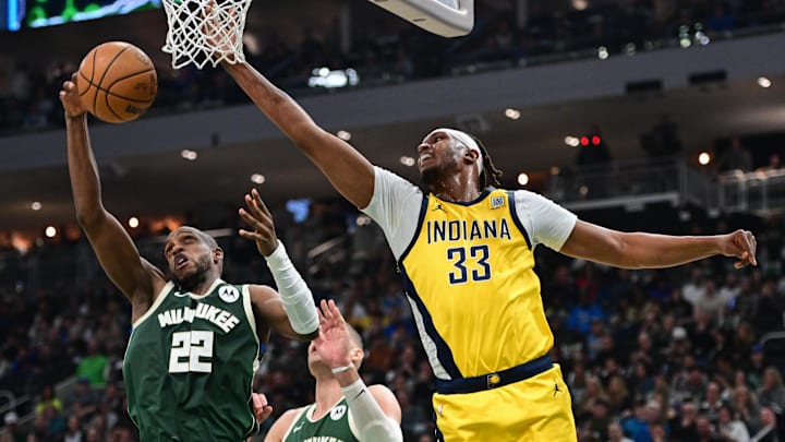 Apr 21, 2024; Milwaukee, Wisconsin, USA; Milwaukee Bucks forward Khris Middleton (22) and Indiana