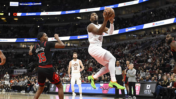 Nov 11, 2024; Chicago, Illinois, USA;  Cleveland Cavaliers guard Donovan Mitchell (45) attempts a shot against the Chicago Bulls during the first half at United Center. Mandatory Credit: Matt Marton-Imagn Images