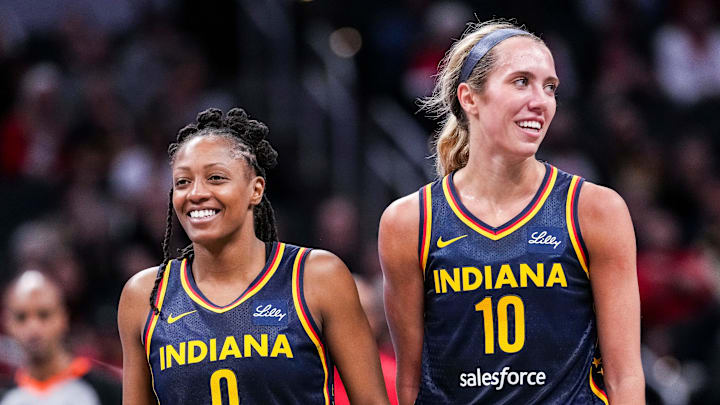 Indiana Fever Kelsey Mitchell (0) and Indiana Fever Lexie Hull (10) smile Saturday, May 3, 2025, during a free throw at a preseason game between the Indiana Fever and the Washington Mystics at Gainbridge Fieldhouse in Indianapolis.