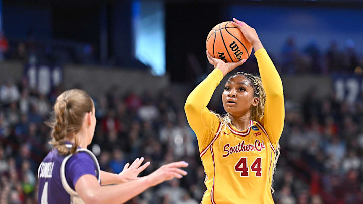 Mar 29, 2025; Spokane, WA, USA; USC Trojans forward Kiki Iriafen (44) shoots against Kansas State Wildcats guard Serena Sundell (4) during the first half of a Sweet 16 NCAA Tournament basketball game at Spokane Arena. at Spokane Arena. Mandatory Credit: James Snook-Imagn Images
