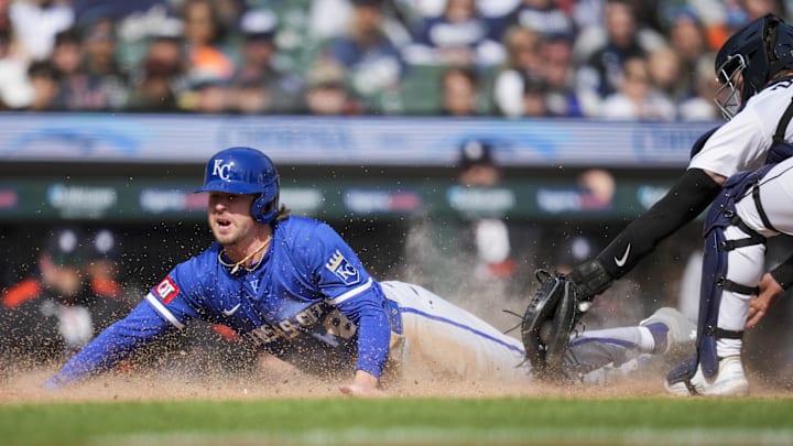 Apr 20, 2025; Detroit, Michigan, USA; Kansas City Royals outfielder Drew Waters (8) scores a run ahead of the tag by Detroit Tigers catcher Dillon Dingler (13) in the 10th inning at Comerica Park. Mandatory Credit: Aaron Doster-Imagn Images