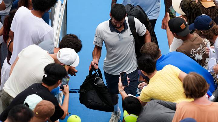 Aug 15, 2026; Mason, OH, USA; Novak Djokovic (SRB) walks off the court after being defeated by Thiago Agustín Tirante (ARG) during the Cincinnati Open at Lindner Family Tennis Center. Mandatory Credit: Aaron Doster-Imagn Images Aug 15, 2026; Mason, OH, USA; Novak Djokovic (SRB) walks off the court after being defeated by Thiago Agustín Tirante (ARG) during the Cincinnati Open at Lindner Family Tennis Center. Mandatory Credit: Aaron Doster-Imagn Images
