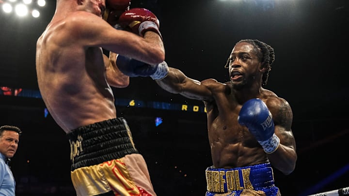 Keyshawn Davis (right) lands a right hand on Jose Pedraza (left) on Feb. 8, 2024, at the Michelob Ultra Arena.