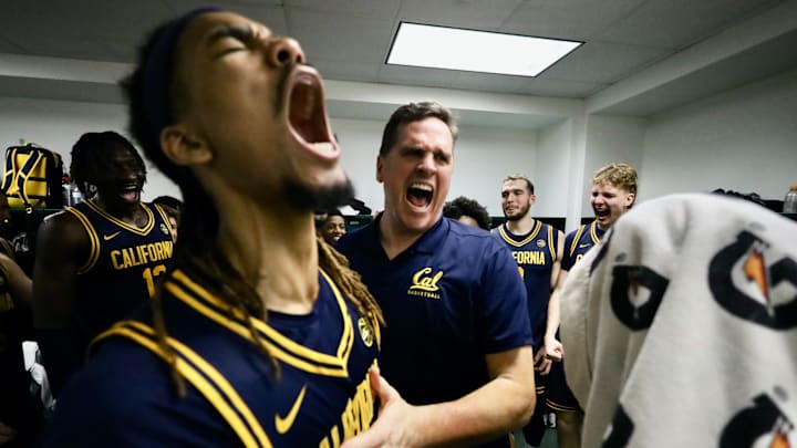Chris Bell, left, and coach Mark Madsen celebrate Cal's win over Miami Chris Bell, left, and coach Mark Madsen celebrate Cal's win over Miami